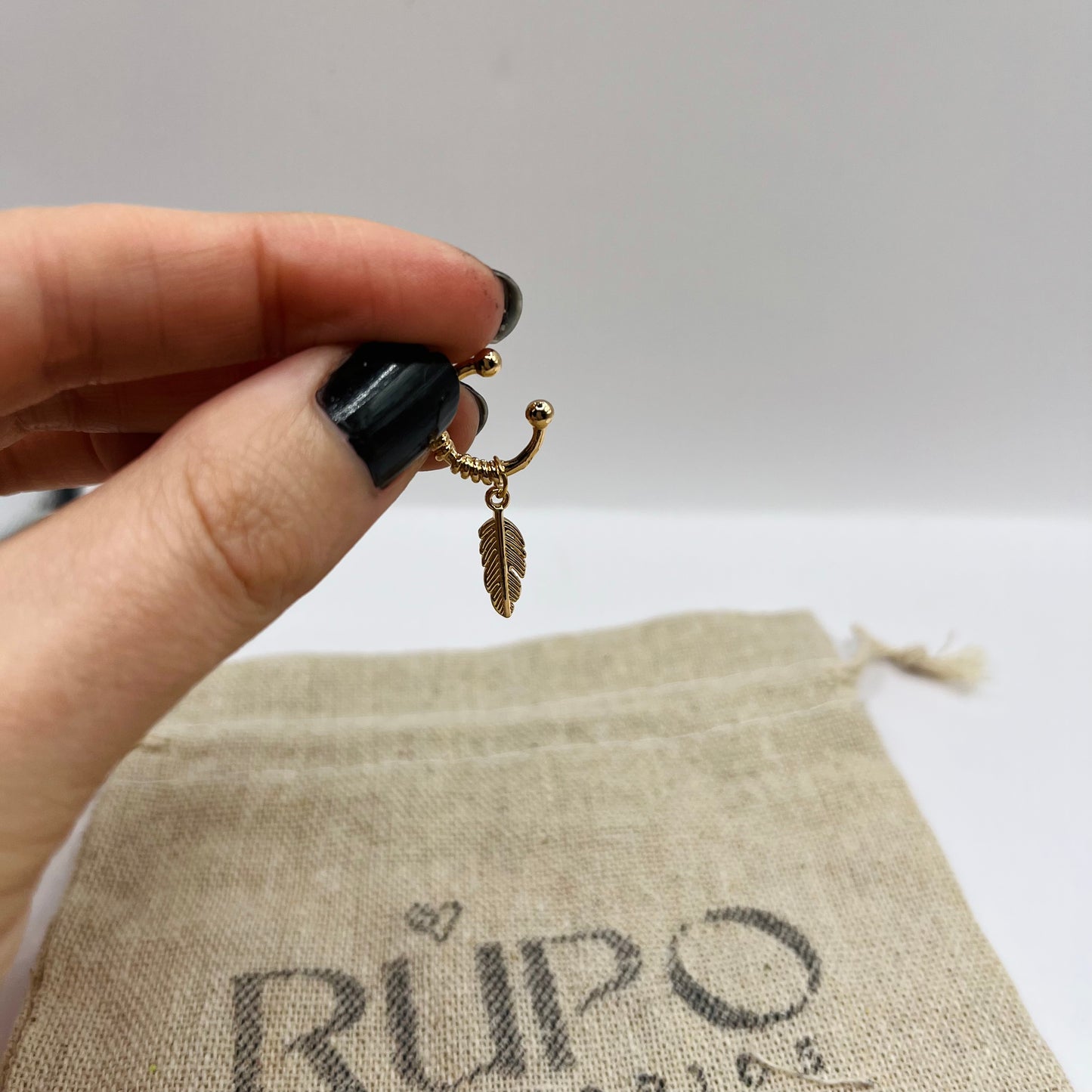 EAR CUFF PLUMA